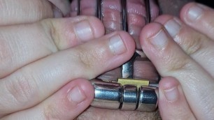 Wife teasing husband locked in chastity